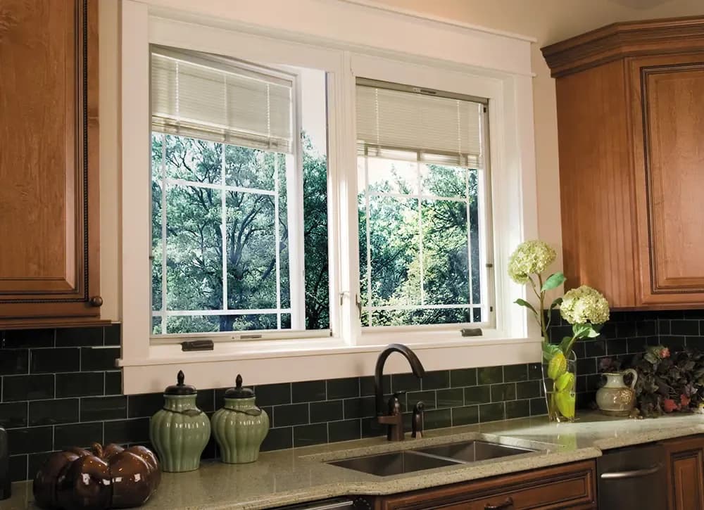 Casement windows above a kitchen sink.