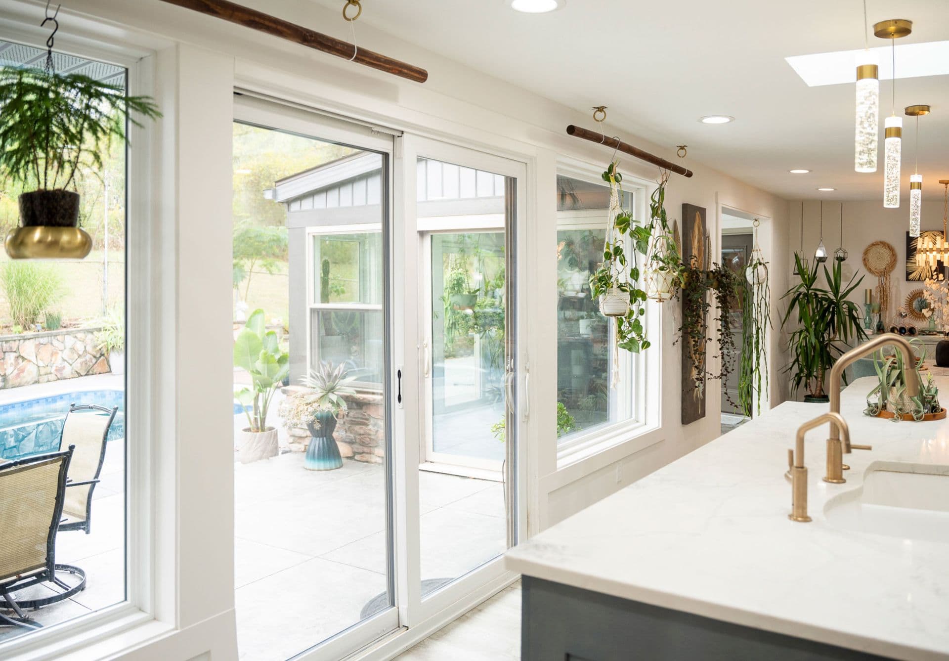 A ProVia Endure™ Sliding Patio Door in White Woodgrain.