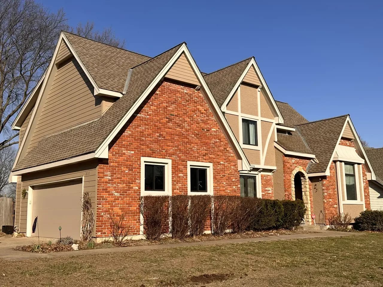 Hardie Siding, New Windows, & Doors Banish Wood Rot on Overland