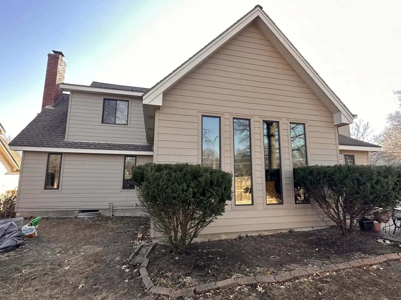 Hardie Siding, New Windows, & Doors Banish Wood Rot on Overland