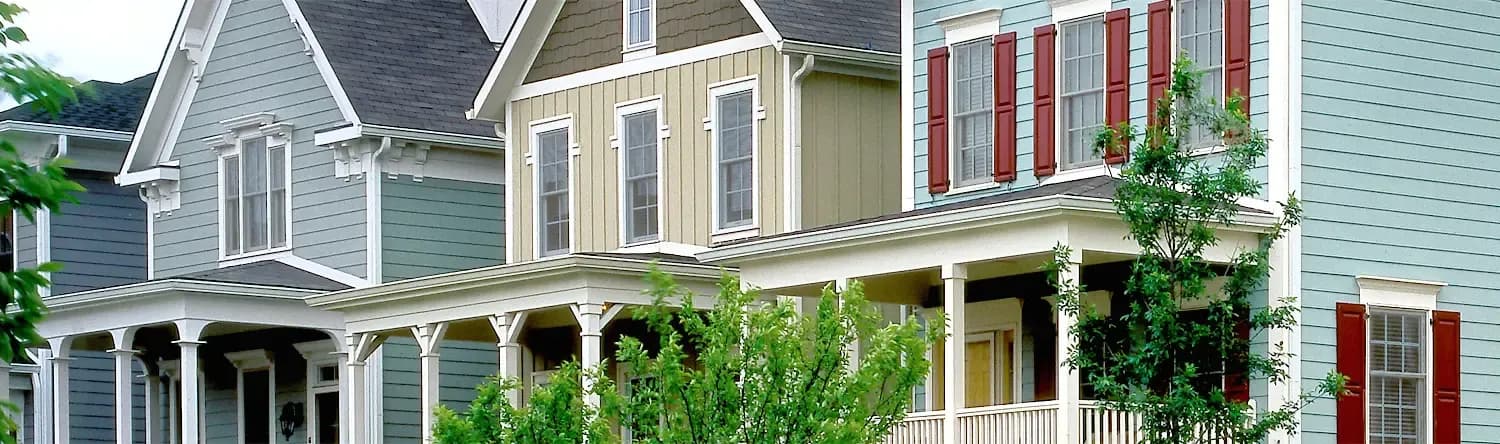 Three houses showing the different James Hardie siding Color options.