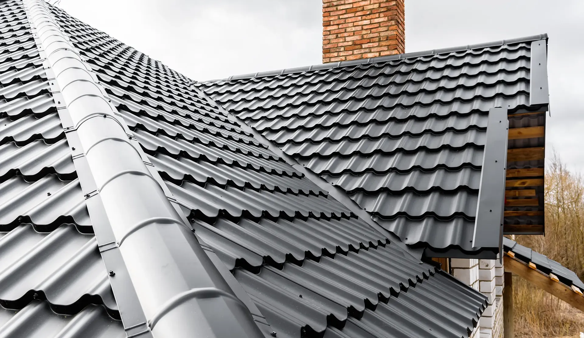 Newly-installed black metal roofing.