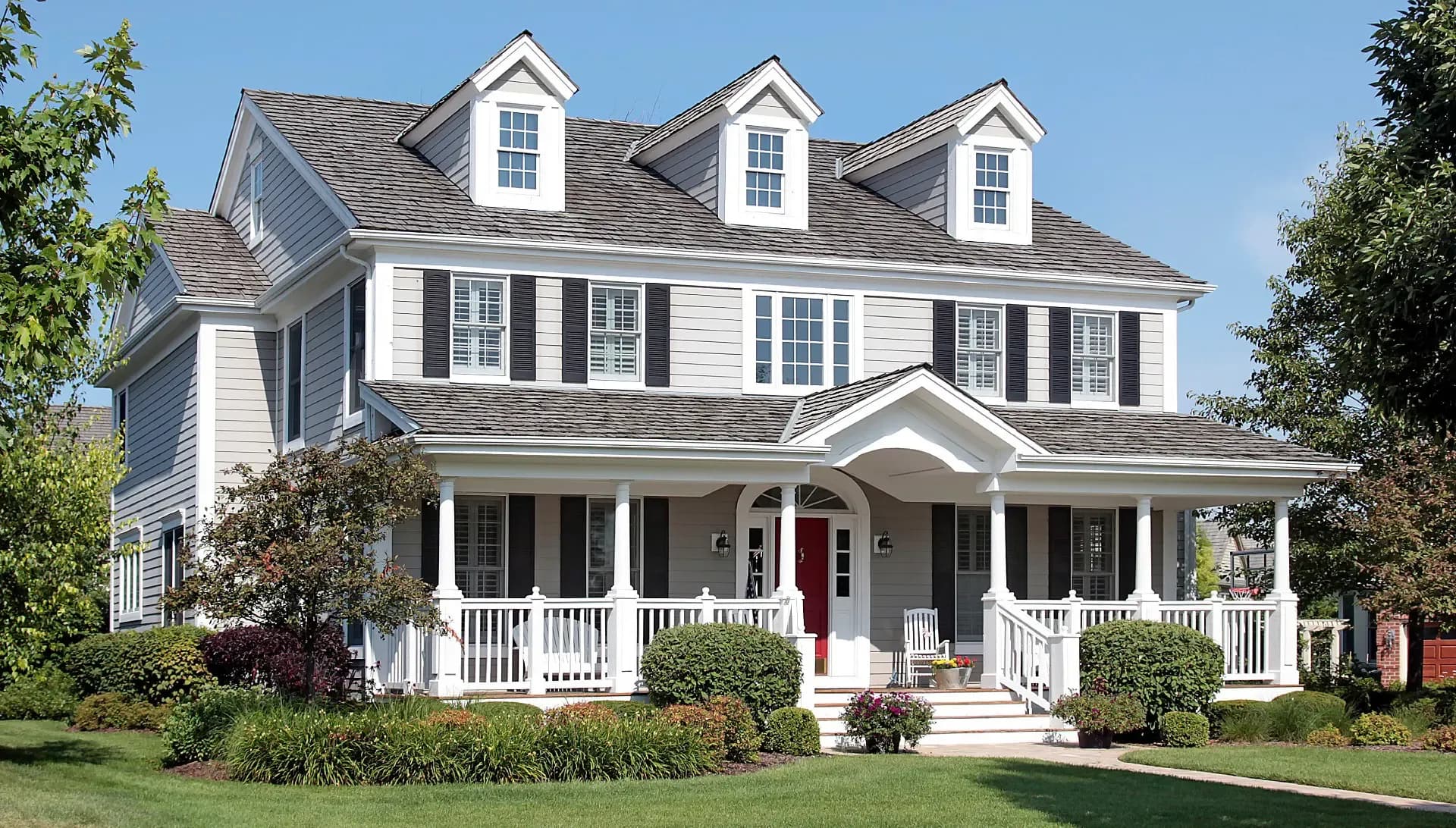 Windows installed on a 2-story home with dormers