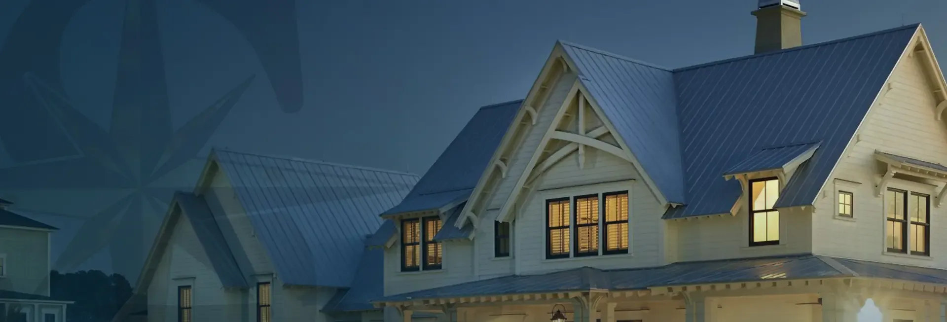 A house with new siding and roofing with the Safe Harbor Exteriors logo superimposed on the left side.