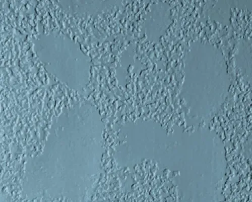 A swatch of blue James Hardie Stucco HardiePanel vertical siding.