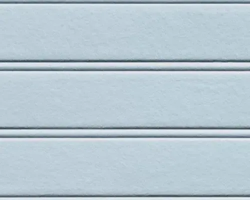 A swatch of light blue-gray James Hardie Beaded Porch Panel HardieSoffit.