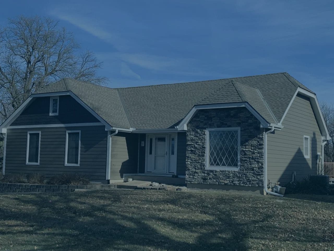 Custom Stone and Hardie siding installed on a home by Safe Harbor Exteriors.