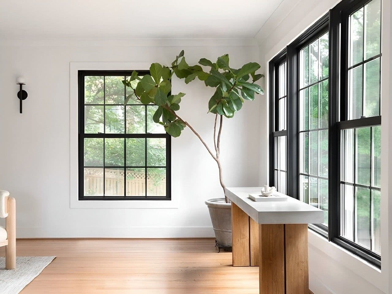 A living room with black framed Wincore Windows.